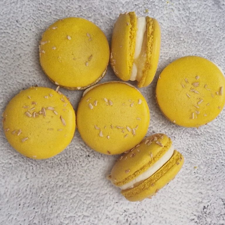 Bright Yellow Macarons with Lemon curd and Lemon Zest